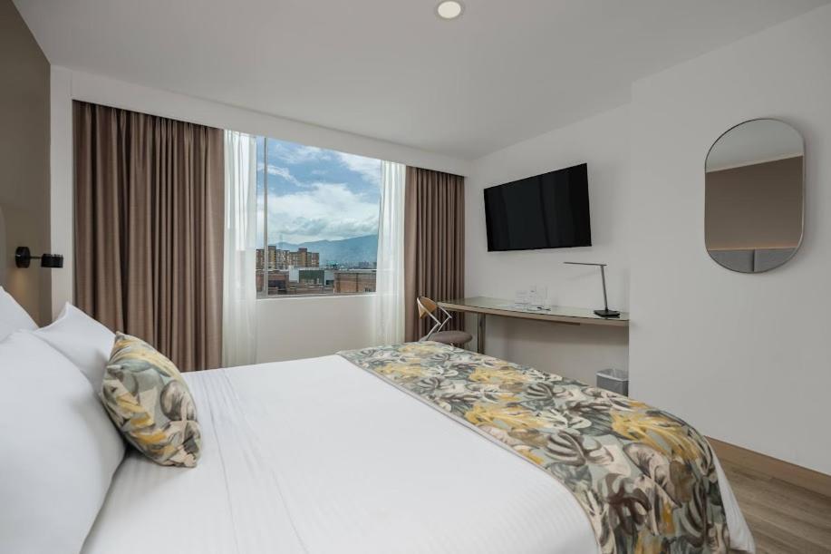Novelty Suites Hotel Medellin Room photo